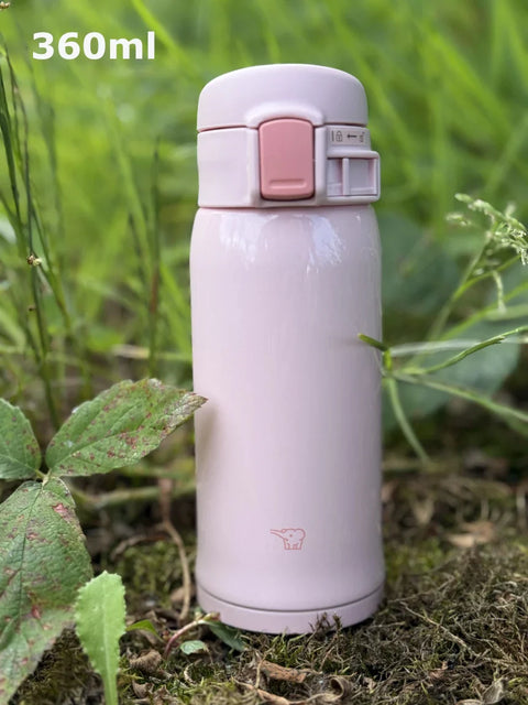 Pink water bottles on the garden