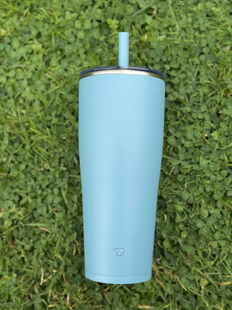 zojirushi aqua green straw tumbler on the grass